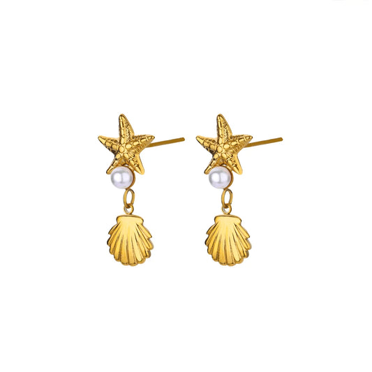 Gold starfish and shell earrings with pearls on a white background